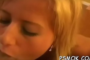 Excited sweetheart smoking while giving a blowjob to her man